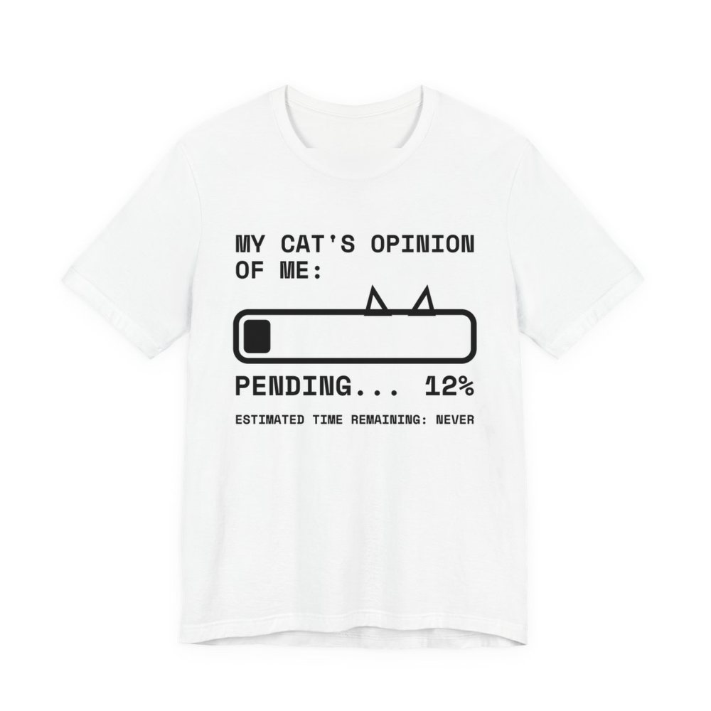 White t-shirt printed in dark ink with “My Cat's Opinion of Me:” above a loading bar with cat ears, stuck at “Pending... 12%”, with “Estimated time remaining: never”