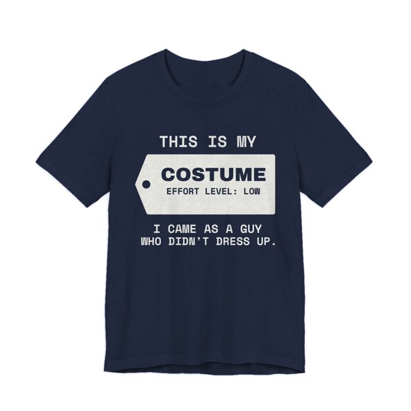 Navy t-shirt printed in off-white ink with “This Is My” above a hang tag reading “Costume, effort level: low”, with “I came as a guy who didn't dress up.”