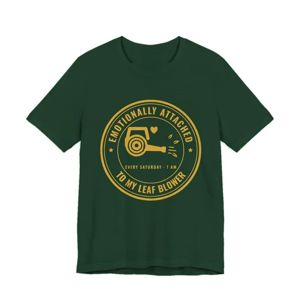 Emotionally Attached to My Leaf Blower tee printed in gold ink on a forest shirt