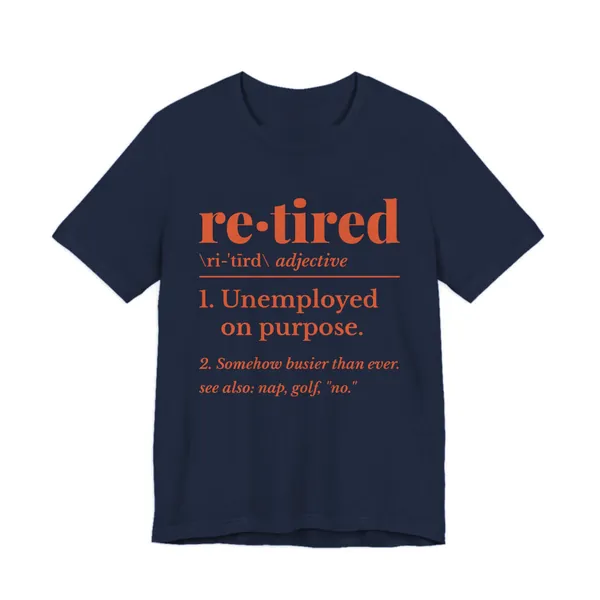 Retired: Unemployed on Purpose tee printed in orange ink on a navy shirt