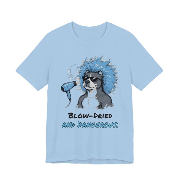 Baby Blue t-shirt printed in full-color print with a full-color pencil drawing of a pit bull in sunglasses with huge blow-dried blue hair and a dryer and the words “Blow-Dried and Dangerous.”
