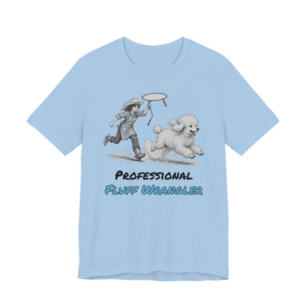 Baby Blue t-shirt printed in full-color print with a full-color pencil drawing of a groomer with a lasso chasing a freshly bathed poodle and the words “Professional Fluff Wrangler”