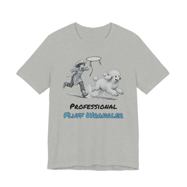 Athletic Heather t-shirt printed in full-color print with a full-color pencil drawing of a groomer with a lasso chasing a freshly bathed poodle and the words “Professional Fluff Wrangler”