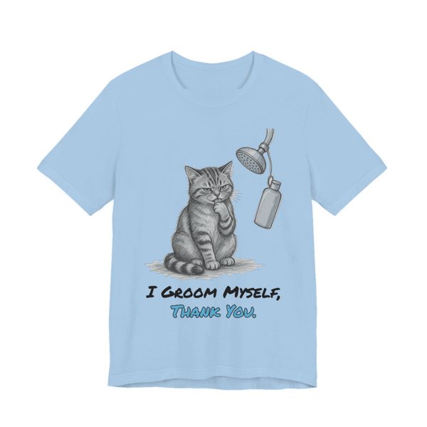 Baby Blue t-shirt printed in full-color print with a full-color pencil drawing of a cat licking its paw next to a shower head and a shampoo bottle and the words “I Groom Myself, Thank You.”