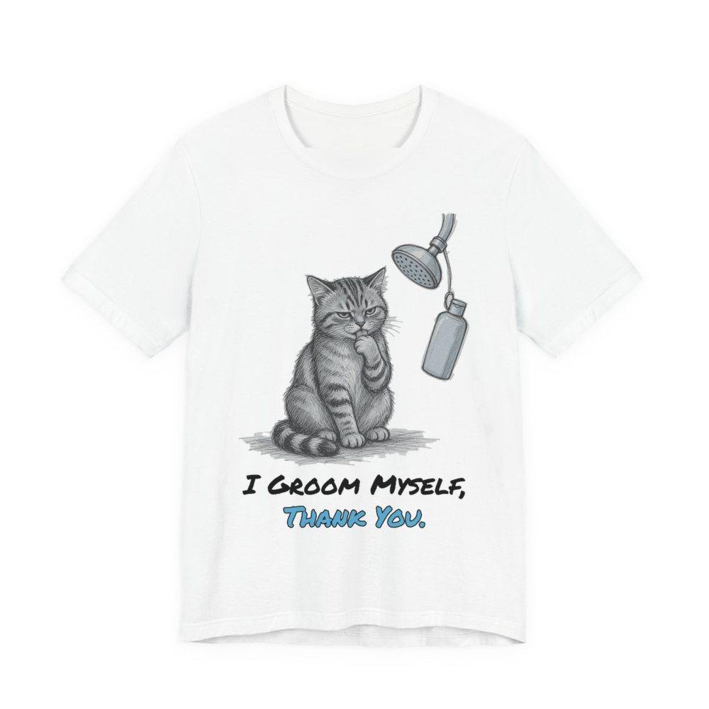 White t-shirt printed in full-color print with a full-color pencil drawing of a cat licking its paw next to a shower head and a shampoo bottle and the words “I Groom Myself, Thank You.”