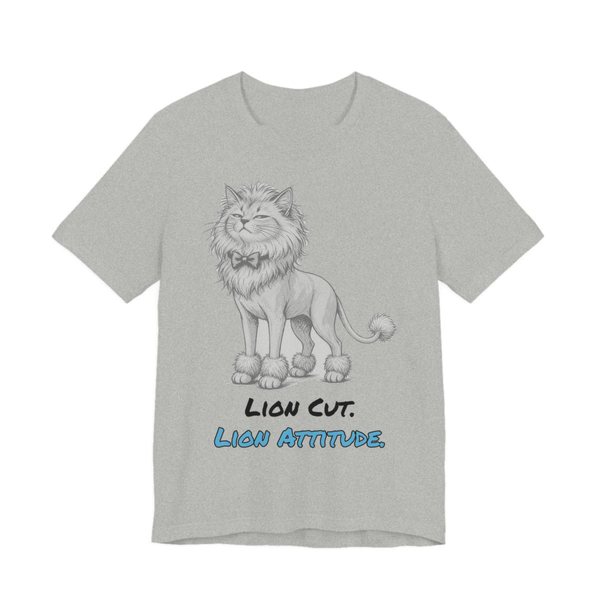 Athletic Heather t-shirt printed in full-color print with a full-color pencil drawing of a cat with a lion cut, a bow tie and a pom-pom tail and the words “Lion Cut. Lion Attitude.”