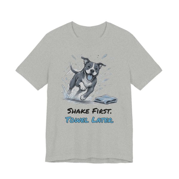 Athletic Heather t-shirt printed in full-color print with a full-color pencil drawing of a pit bull shaking off water next to a towel and the words “Shake First. Towel Later.”