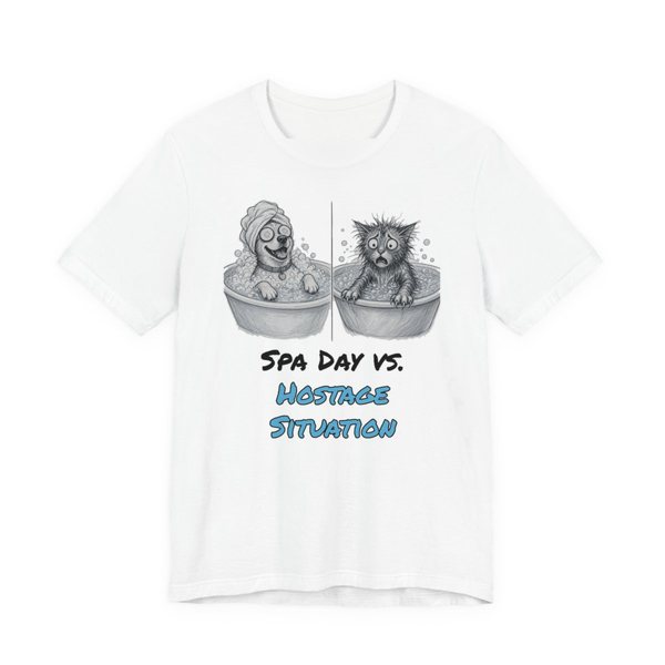 White t-shirt printed in full-color print with a full-color pencil drawing of a happy dog in a bubble bath next to a frazzled wet cat and the words “Spa Day vs. Hostage Situation”