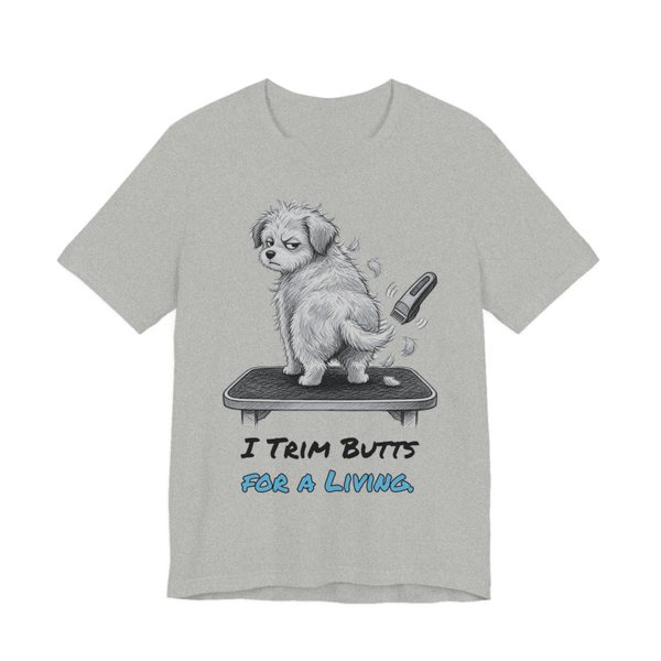 Athletic Heather t-shirt printed in full-color print with a full-color pencil drawing of a fluffy dog on a grooming table and a pair of clippers and the words “I Trim Butts for a Living.”