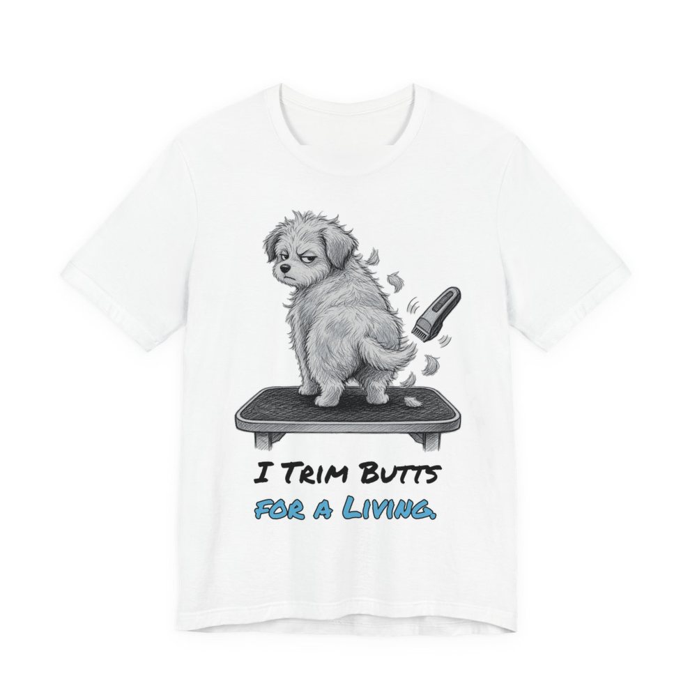 White t-shirt printed in full-color print with a full-color pencil drawing of a fluffy dog on a grooming table and a pair of clippers and the words “I Trim Butts for a Living.”