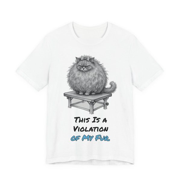 White t-shirt printed in full-color print with a full-color pencil drawing of a big fluffy cat glaring from a grooming table and the words “This Is a Violation of My Fur.”