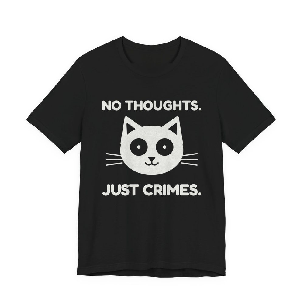 Black t-shirt printed in off-white ink with “No Thoughts.” and “Just Crimes.” around a cartoon cat face with big round eyes