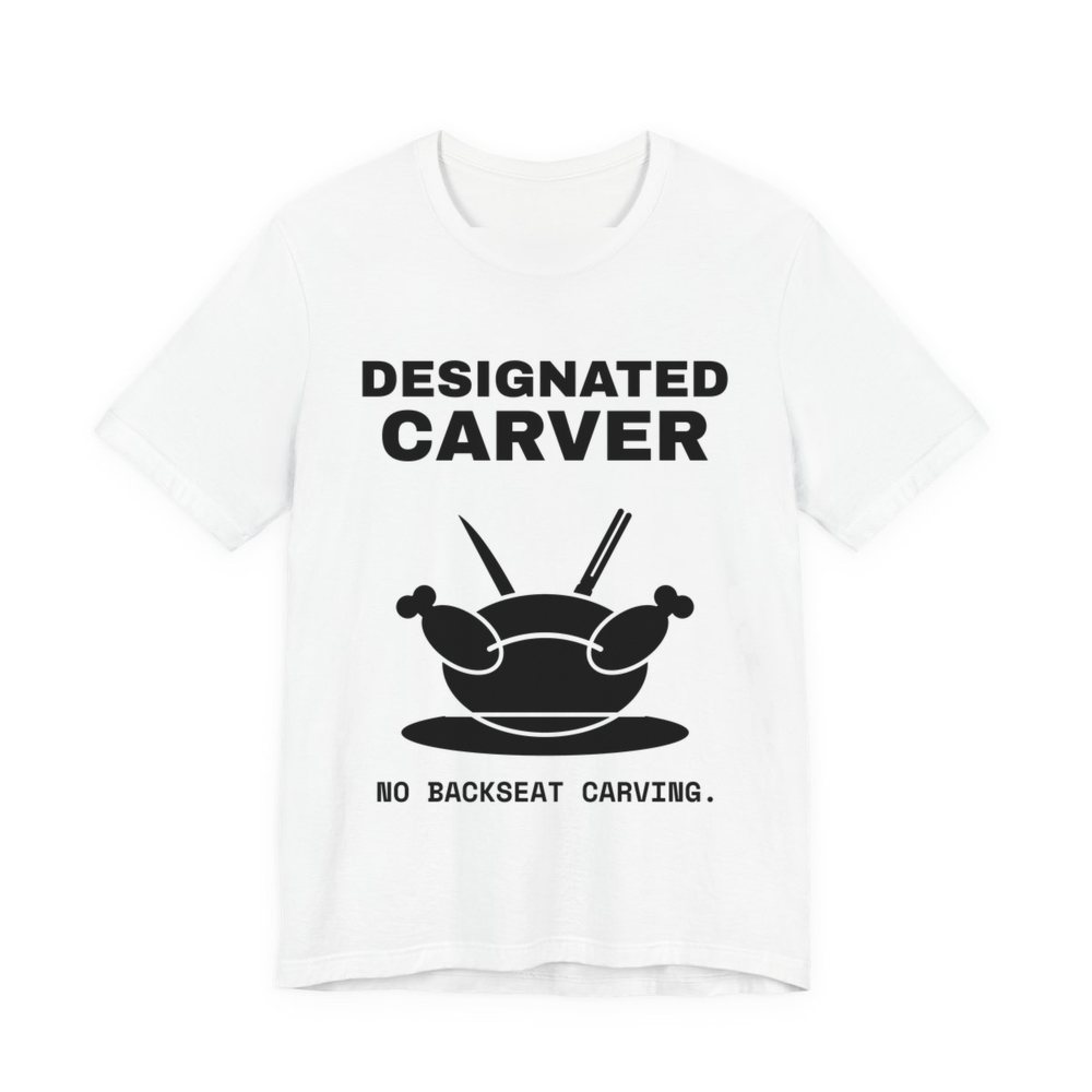 White t-shirt printed in dark ink with a crossed carving knife and fork and the words “Designated Carver”