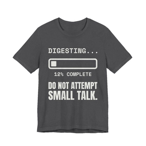 Dark Grey Heather t-shirt printed in off-white ink with “Digesting…” above a progress bar at 12% complete, with “Do Not Attempt Small Talk.”