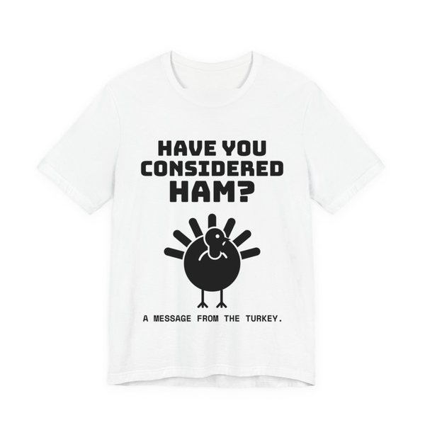 White t-shirt printed in dark ink with a turkey asking “Have You Considered Ham?”