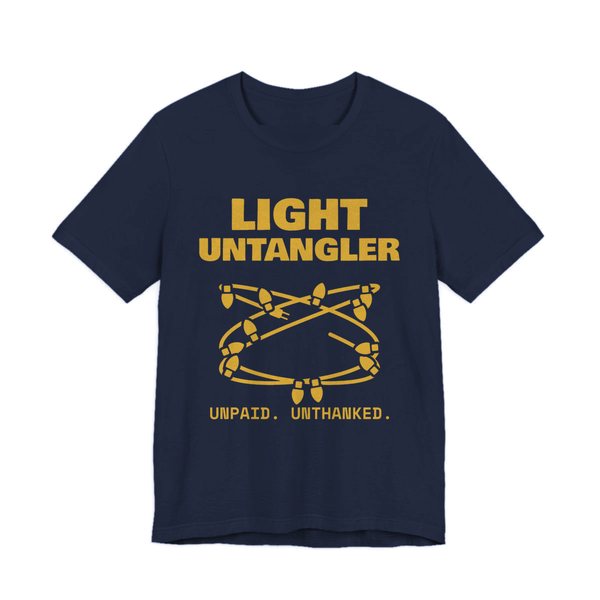 Navy t-shirt printed in gold ink with a hopelessly tangled string of Christmas lights and the words “Light Untangler. Unpaid. Unthanked.”