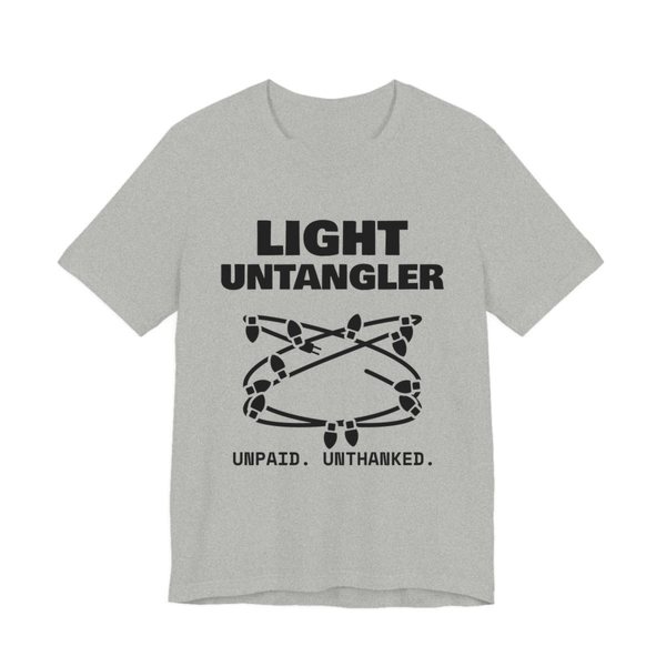 Athletic Heather t-shirt printed in dark ink with a hopelessly tangled string of Christmas lights and the words “Light Untangler. Unpaid. Unthanked.”