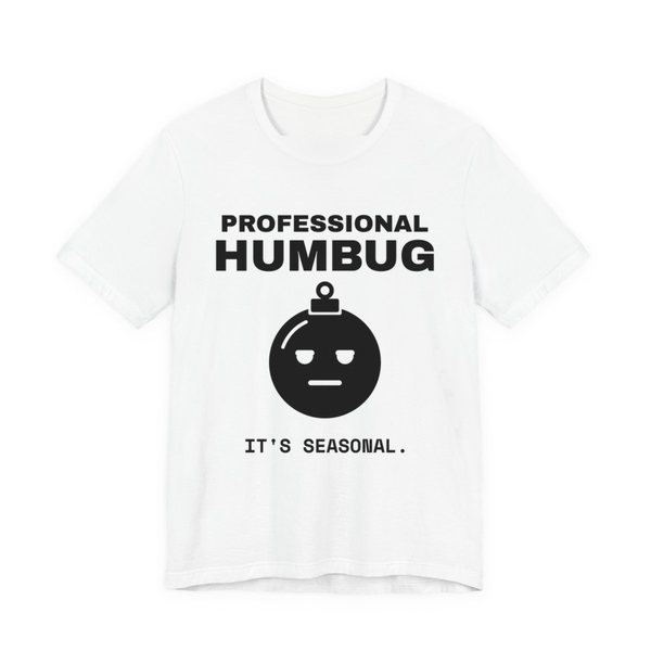 White t-shirt printed in dark ink with an unimpressed ornament face and the words “Professional Humbug. It's Seasonal.”