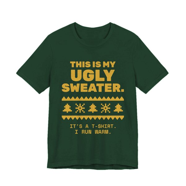 Forest t-shirt printed in gold ink with a pixel-knit sweater pattern and the words “This Is My Ugly Sweater. It's a T-shirt. I run warm.”