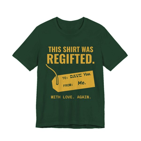Forest t-shirt printed in gold ink with a gift tag with “Dave” crossed out for “You” and the words “This Shirt Was Regifted. With Love. Again.”