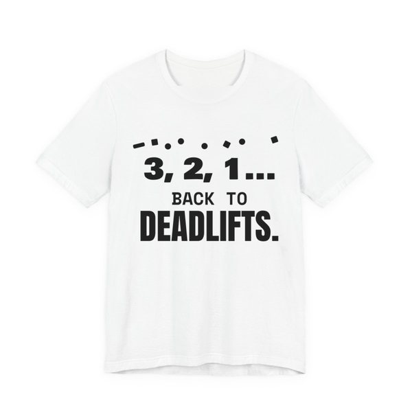 White t-shirt printed in dark ink with confetti and the words “3, 2, 1... Back to Deadlifts.”