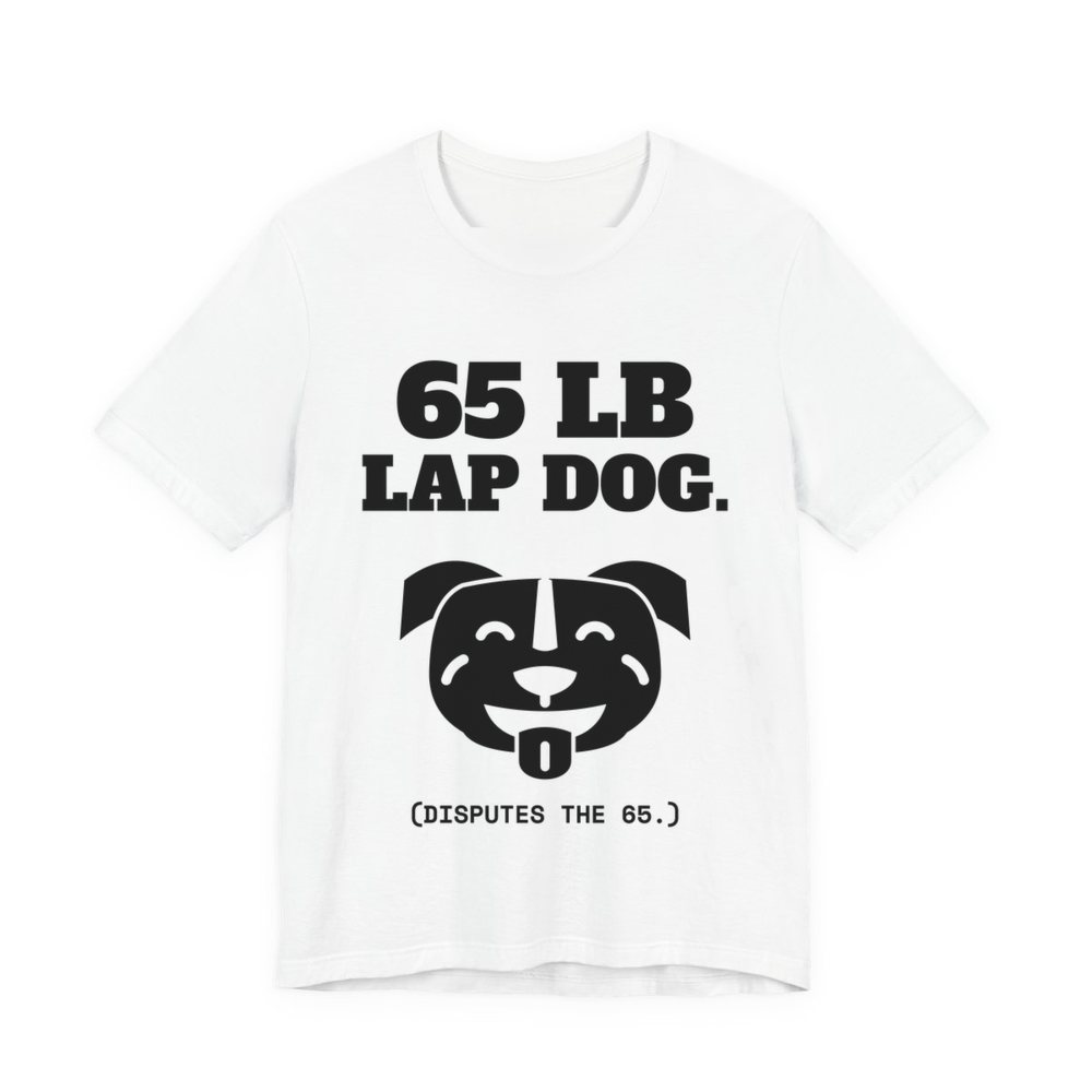 White t-shirt printed in dark ink with a smiling pit bull face and the words “65 lb Lap Dog. (Disputes the 65.)”