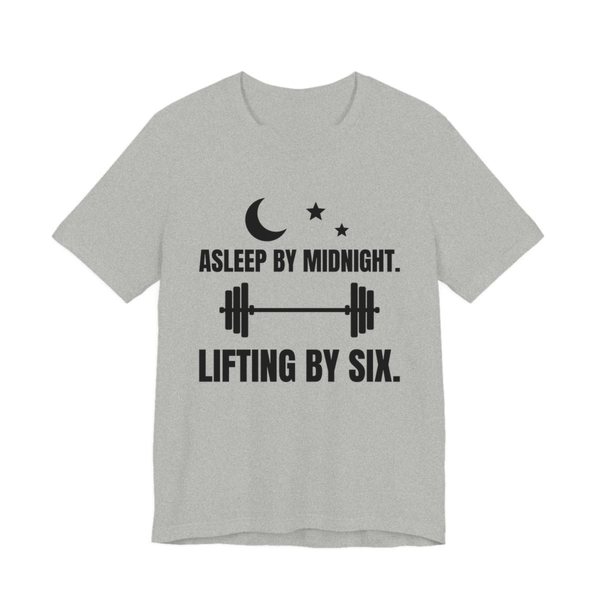 Athletic Heather t-shirt printed in dark ink with a moon and stars, a barbell and the words “Asleep by Midnight. Lifting by Six.”
