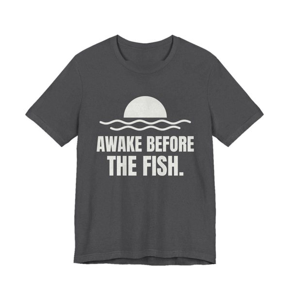 Dark Grey Heather t-shirt printed in off-white ink with a sun rising over the water and the words “Awake Before the Fish.”