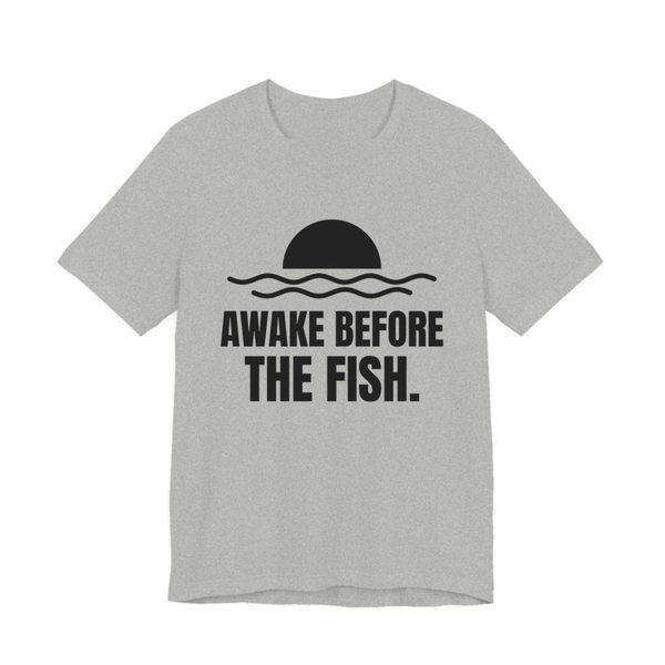 Athletic Heather t-shirt printed in dark ink with a sun rising over the water and the words “Awake Before the Fish.”