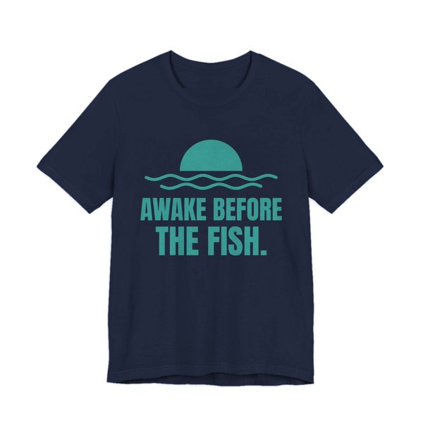 Navy t-shirt printed in teal ink with a sun rising over the water and the words “Awake Before the Fish.”