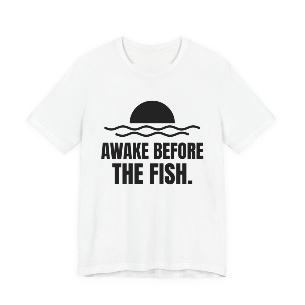 White t-shirt printed in dark ink with a sun rising over the water and the words “Awake Before the Fish.”