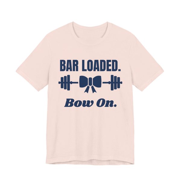 Soft Pink t-shirt printed in navy blue ink with a barbell tied with a bow and the words "Bar Loaded. Bow On."