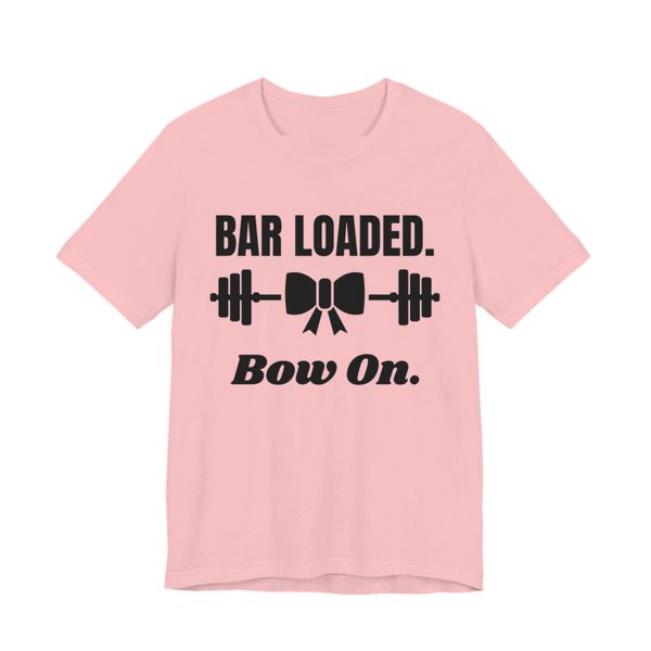 Pink t-shirt printed in dark ink with a barbell tied with a bow and the words "Bar Loaded. Bow On."