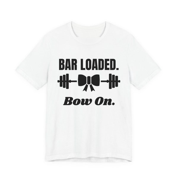 White t-shirt printed in dark ink with a barbell tied with a bow and the words "Bar Loaded. Bow On."