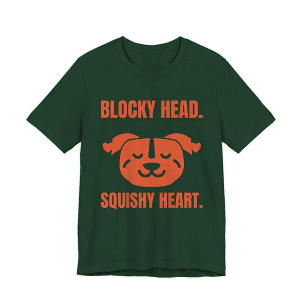 Forest t-shirt printed in orange ink with a pit bull face with hearts and the words “Blocky Head. Squishy Heart.”