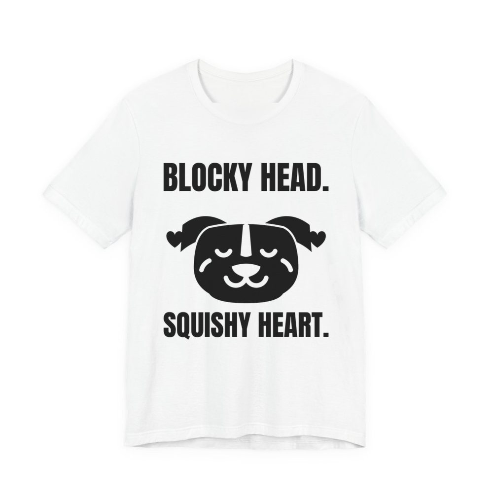 White t-shirt printed in dark ink with a pit bull face with hearts and the words “Blocky Head. Squishy Heart.”