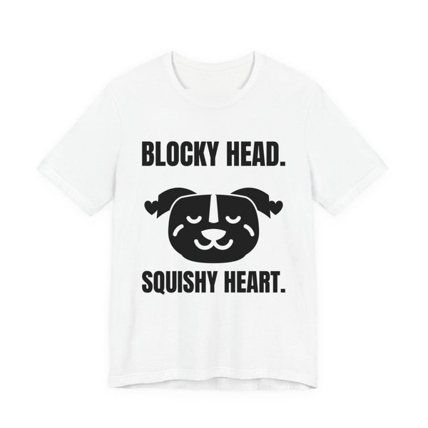 White t-shirt printed in dark ink with a pit bull face with hearts and the words “Blocky Head. Squishy Heart.”