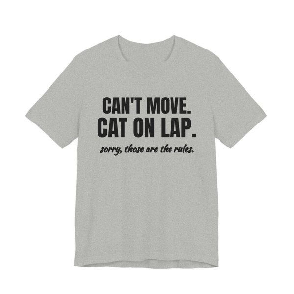 Athletic Heather t-shirt printed in dark ink with the words “Can't Move. Cat on Lap.”