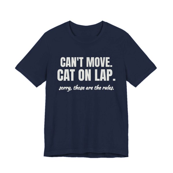 Navy t-shirt printed in off-white ink with the words “Can't Move. Cat on Lap.”