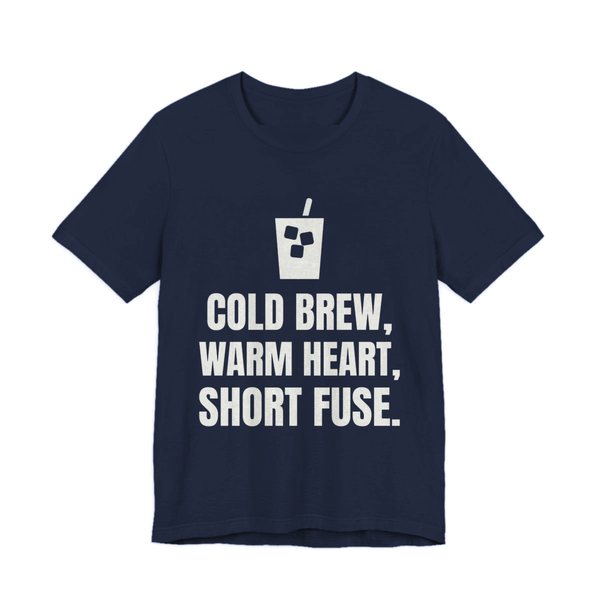 Navy t-shirt printed in off-white ink with an iced coffee and the words “Cold Brew, Warm Heart, Short Fuse.”