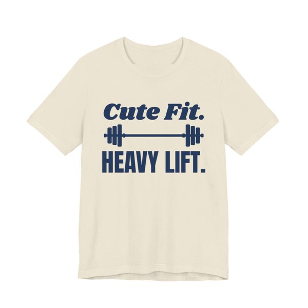 Natural t-shirt printed in navy blue ink with a barbell between the words "Cute Fit." and "Heavy Lift."