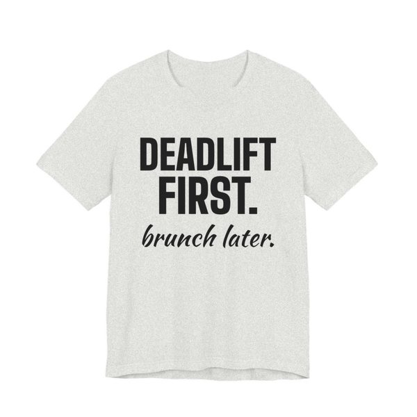 Ash t-shirt printed in dark ink with the words "Deadlift First. Brunch Later."
