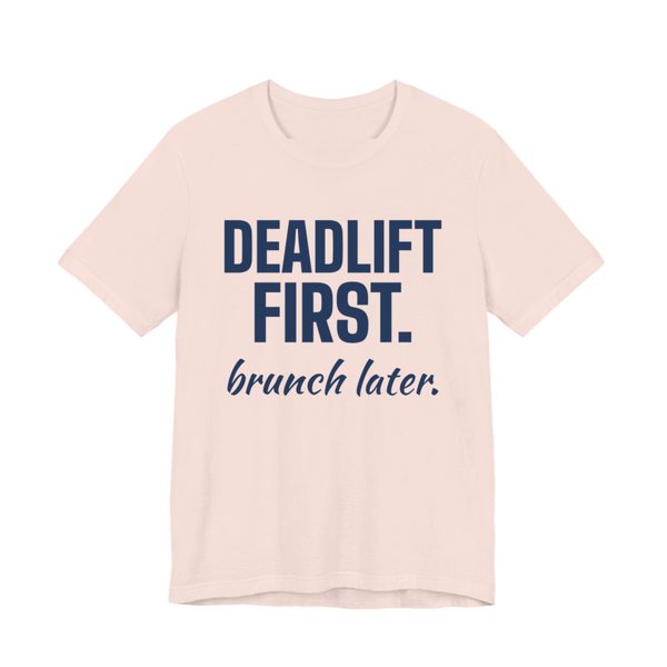Soft Pink t-shirt printed in navy blue ink with the words "Deadlift First. Brunch Later."