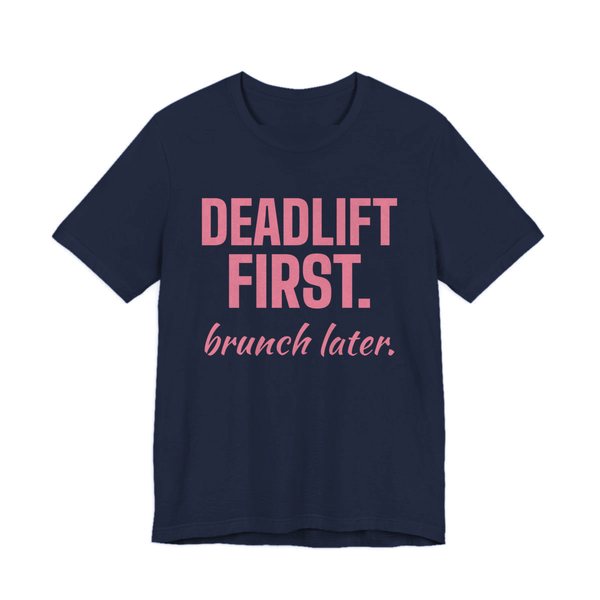 Navy t-shirt printed in rose pink ink with the words "Deadlift First. Brunch Later."