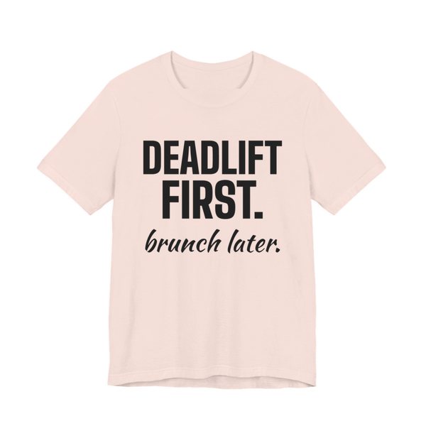Soft Pink t-shirt printed in dark ink with the words "Deadlift First. Brunch Later."