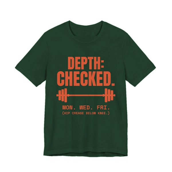 Forest t-shirt printed in orange ink with a barbell and the words “Depth: Checked. Mon. Wed. Fri. (Hip crease below knee.)”