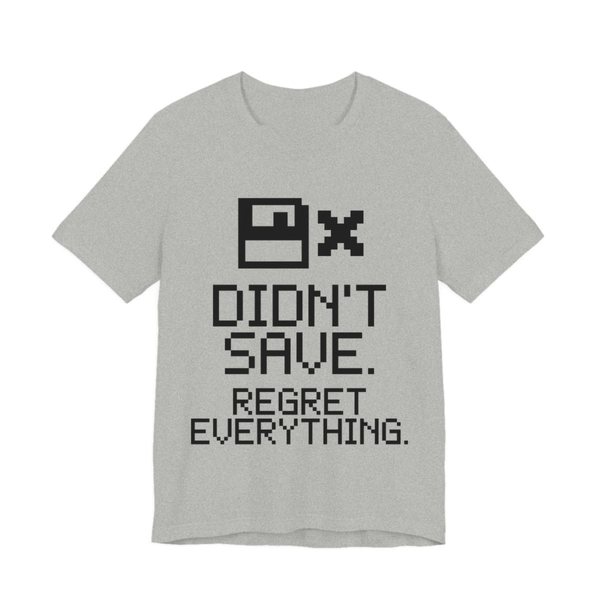 Athletic Heather t-shirt printed in dark ink with a pixel floppy disk with an X and the words “Didn't Save. Regret Everything.”