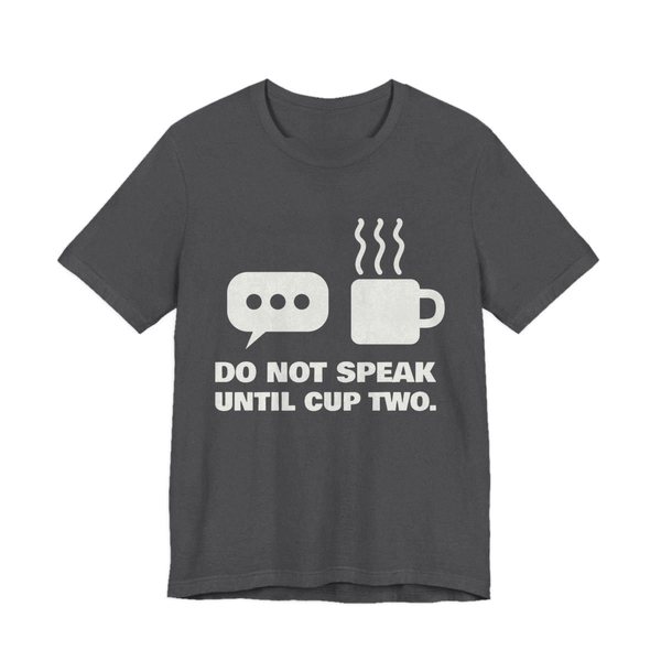 Dark Grey Heather t-shirt printed in off-white ink with a speech bubble, a steaming mug and the words “Do Not Speak Until Cup Two.”