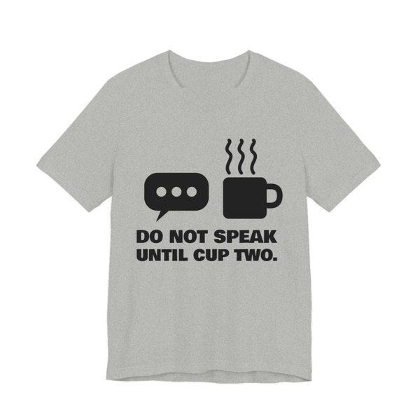 Athletic Heather t-shirt printed in dark ink with a speech bubble, a steaming mug and the words “Do Not Speak Until Cup Two.”