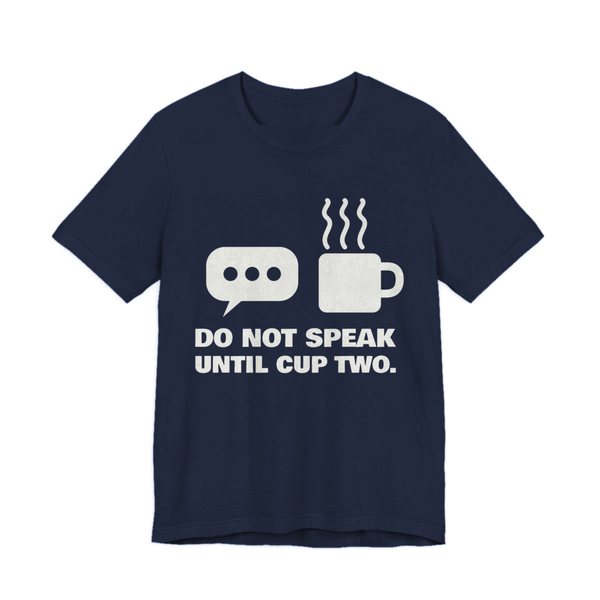 Navy t-shirt printed in off-white ink with a speech bubble, a steaming mug and the words “Do Not Speak Until Cup Two.”